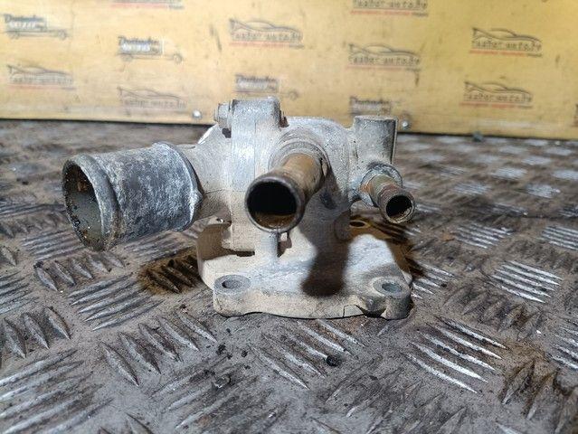 Корпус термостата E64HPU Mazda Premacy купить в магазине запчастей бу