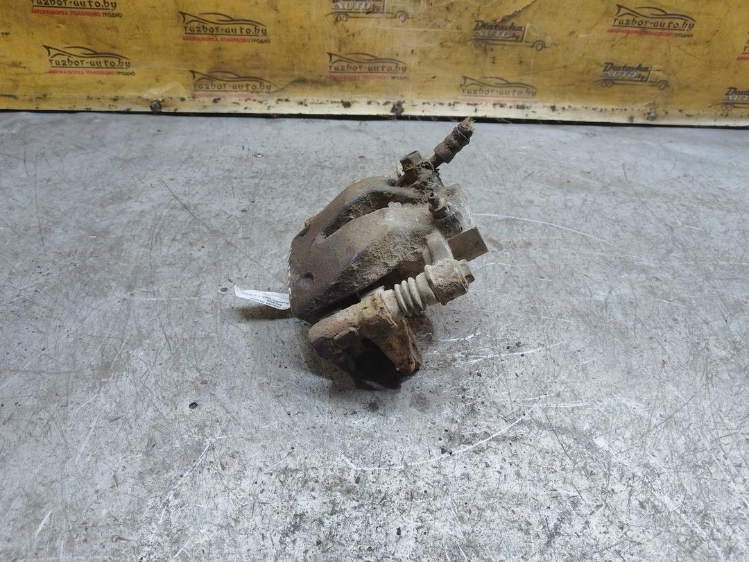 Суппорт задний левый 65L9Q8 Toyota Avensis - Фото 1