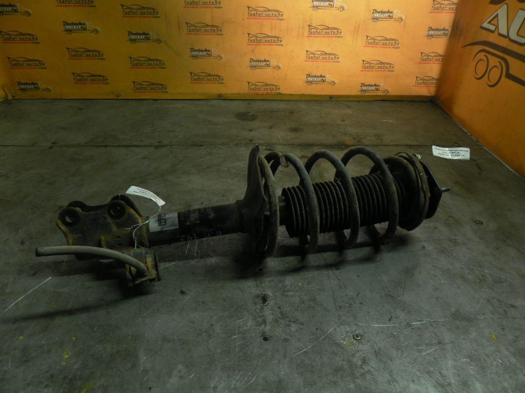 Амортизатор передний правый WKU4EM Nissan Almera - Фото 1