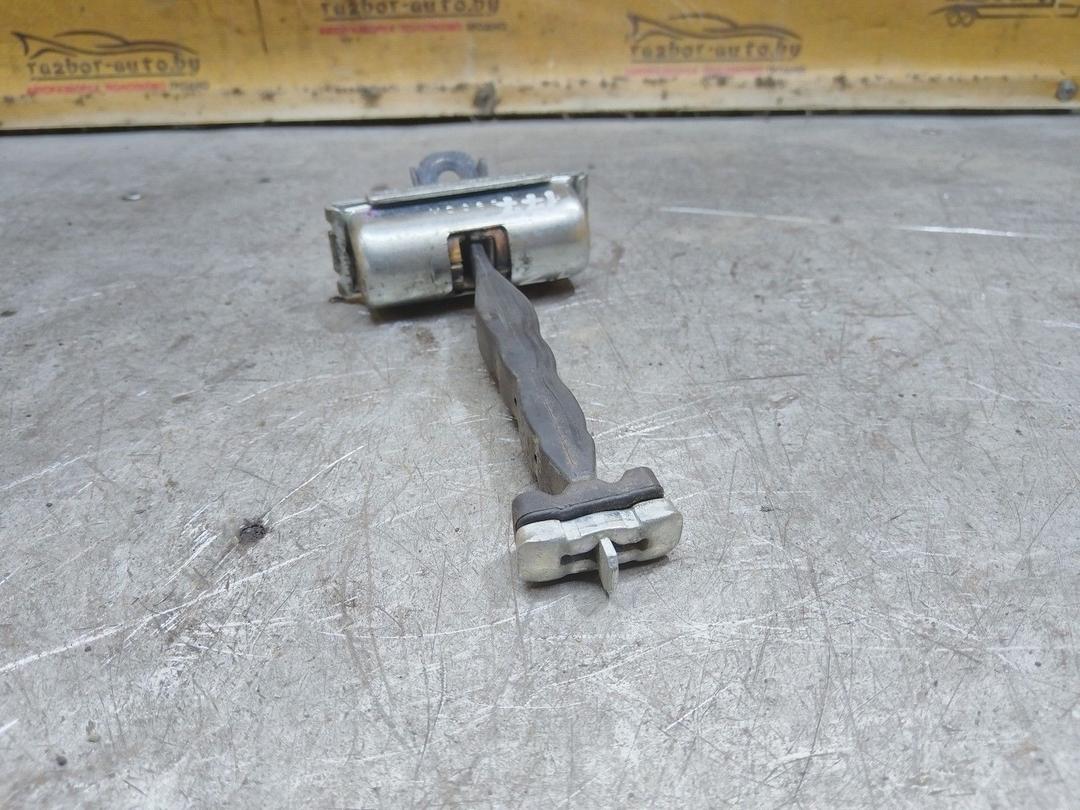 Ограничитель открывания двери задней Q1333M Ford Fusion купить в магазине запчастей бу