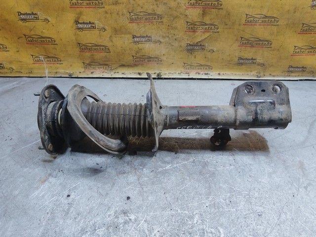 Амортизатор передний правый JZW6KC Toyota Corolla Verso