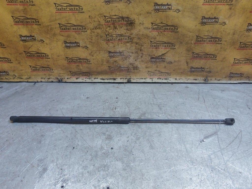 Амортизатор капота KC9O1R Volkswagen Jetta - Фото 1