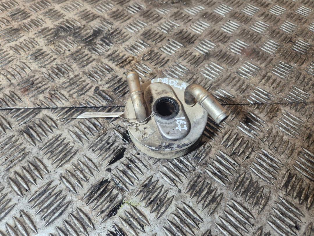 Теплообменник масляного фильтра L0X00P Toyota Corolla