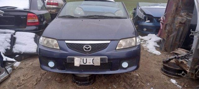 Амортизатор передний левый HJUM71 Mazda Premacy