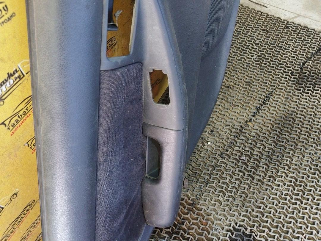 Обшивка двери задней левой (дверная карта) AXWC26 Toyota Corolla купить с доставкой