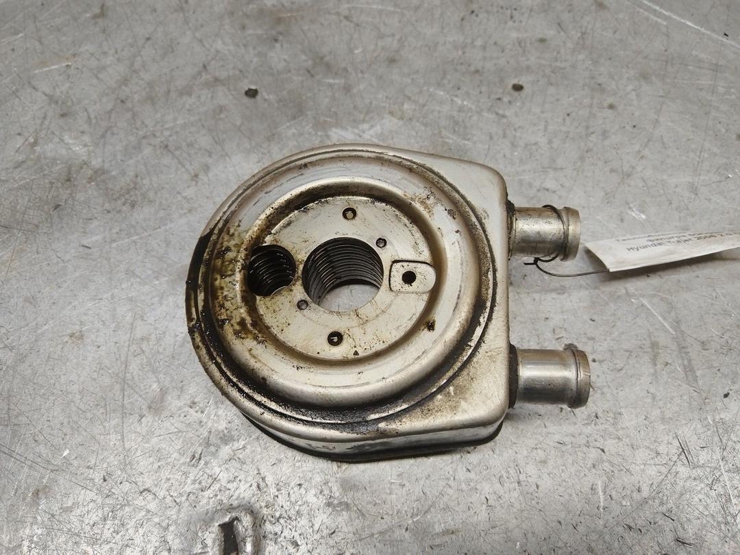 Теплообменник масляного фильтра 6QO99S Hyundai Trajet