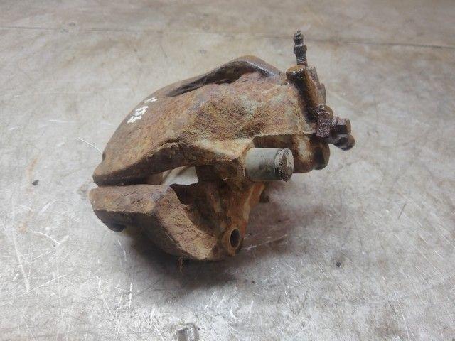 Суппорт передний правый Q2J4FM Opel Astra купить в магазине запчастей бу