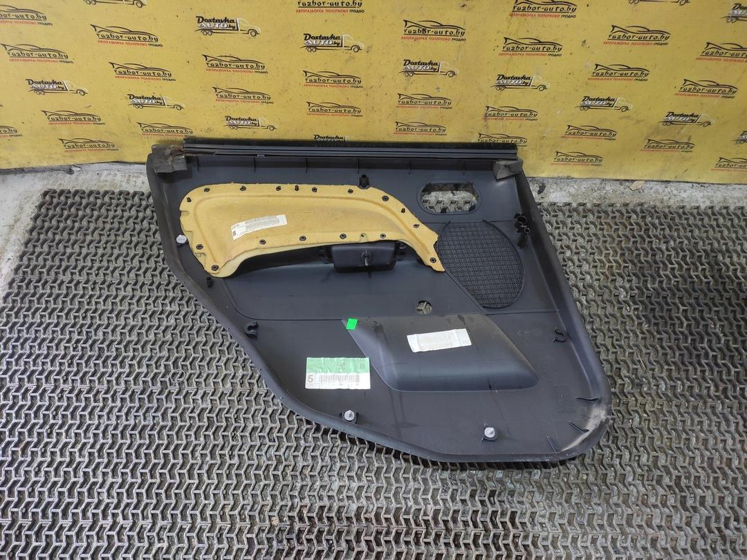Обшивка двери задней правой (дверная карта) JFKKXN Ford Fiesta купить