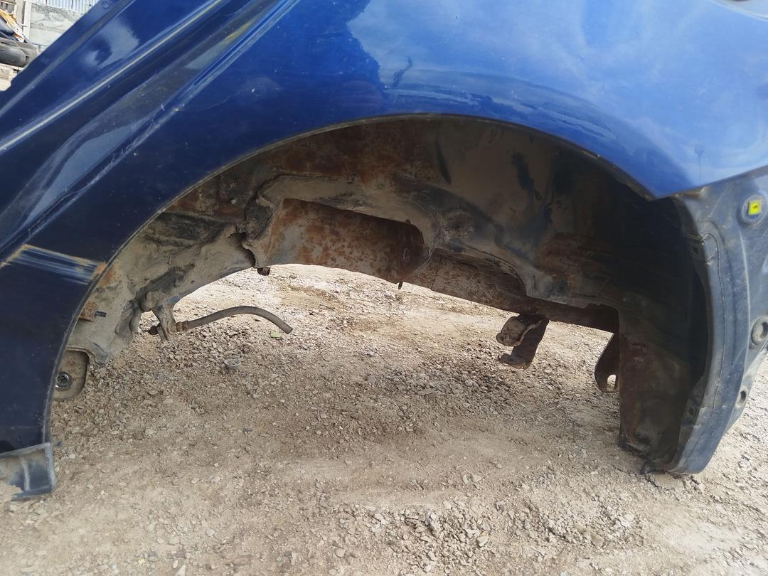 Крыло заднее левое 8VADMQ Toyota Corolla