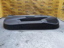 Обшивка двери передней левой (дверная карта) 09G90U Opel Astra купить с доставкой