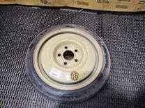 Колесо запасное (таблетка) ZGN0VC Mazda Premacy