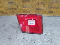 Фонарь крышки багажника левый YF141Z Mitsubishi Carisma