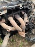 Коллектор выпускной 0LYDAT Mazda 626