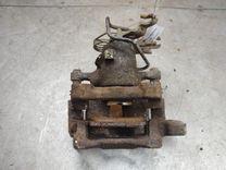 Суппорт задний левый Z9MVWU Volkswagen Caddy купить в магазине запчастей бу