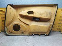 Обшивка двери передней левой (дверная карта) D1L2IT Mitsubishi Carisma купить на авторазборке