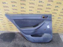 Обшивка двери задней левой (дверная карта) S98NUU Toyota Avensis