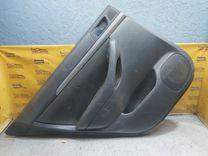 Обшивка двери задней левой (дверная карта) XBAL4K Toyota Avensis купить