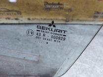 Стекло двери передней левой 0AN75S Mitsubishi Carisma купить в магазине запчастей бу