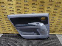 Обшивка двери задней левой (дверная карта) E8JI7G Mitsubishi Grandis купить