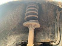 Амортизатор задний левый 1Y2UV1 Mazda 626