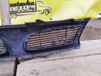 Решетка радиатора RA9TG2 Mitsubishi Carisma купить на авторазборке