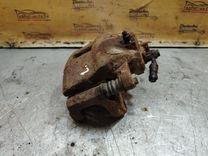 Суппорт передний левый HH1XMV Nissan Primera - Фото 1