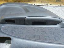 Обшивка двери задней левой (дверная карта) 13W7FK Toyota Corolla купить в магазине запчастей бу