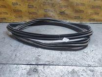 Уплотнитель двери задней левой 3L7TK4 Opel Astra - Фото 2