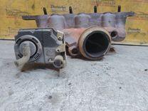 Коллектор выпускной A0V7S1 Ford Escort купить на авторазборке