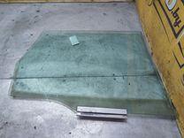 Стекло двери задней левой K053JP Opel Astra купить на авторазборке