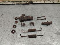 Механизм развода задних тормозных колодок левый 37QKCD Kia Sorento - Фото 2