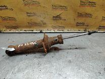 Амортизатор задний левый F07JGS Nissan Primera - Фото 1