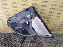 Обшивка двери задней левой (дверная карта) AXWC26 Toyota Corolla купить на авторазборке