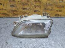 Фара правая 6MWJDM Ford Escort