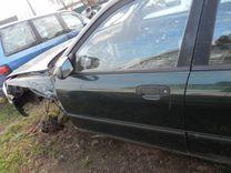 Стекло двери передней левой 02J9NK Mazda 323F