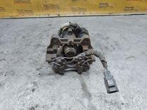 Суппорт задний правый 9EM182 Ford Fusion купить в магазине запчастей бу