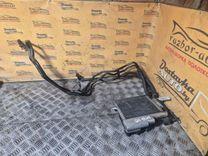 Радиатор масляный JMGM1Y Audi A4