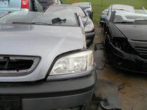 Ус под фару левый CO31JE Opel Zafira