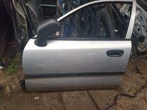 Замок двери передней левой 7N8T02 Mitsubishi Carisma