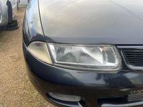 Фара левая XAYP78 Mitsubishi Carisma купить