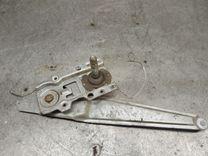 Стеклоподъемник задний левый W7CFL4 Mazda 323F