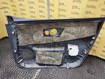 Обшивка двери передней левой (дверная карта) UO8WTJ Nissan Note купить в магазине запчастей бу