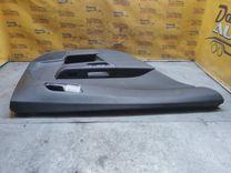 Обшивка двери задней левой (дверная карта) CX5UEL Opel Astra купить с доставкой