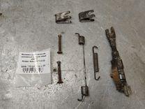 Механизм развода задних тормозных колодок левый J266T4 Nissan Note - Фото 1