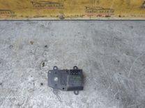 Моторчик заслонки печки QXHTH4 Kia Carnival