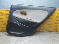 Обшивка двери задней правой (дверная карта) 4E7KMW Mitsubishi Carisma купить с доставкой