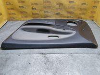 Обшивка двери передней правой (дверная карта) 76Q40G Mitsubishi Carisma купить в магазине запчастей бу