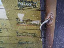 Стекло заднее UIDA28 Chrysler Voyager купить на авторазборке