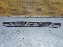 Накладка подсветки номера 2N1V0S Opel Astra - Фото 2