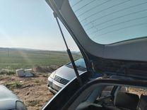 Амортизатор крышки багажника (3-5 двери) KH9XAY Toyota Avensis